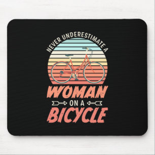 A Woman On A Bicycle Mouse Mat