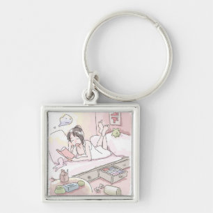 A woman's illustration of a pink bedroom lying dow key ring
