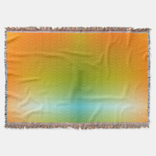 A woven blanket with a gradient design
