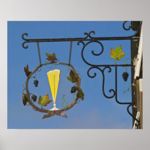 A wrought iron sign that illustrates the theme