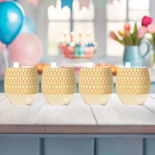 a yellow and white background with an intricate de stemless wine glass