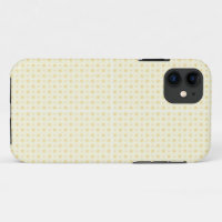 a yellow and white background with small circles