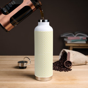 a yellow and white background with small circles water bottle