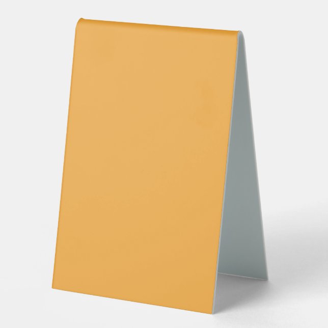 a yellow background with a black border (Front)