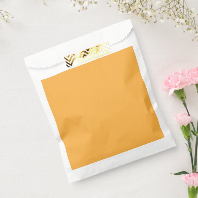 a yellow background with a favour bags (Sealed)