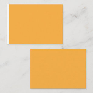 a yellow background with a place card