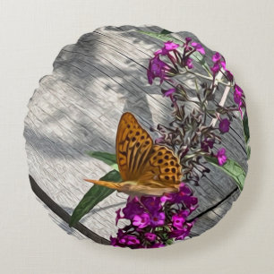 A yellow butterfly round cushion