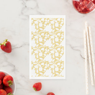A yellow rug with a repeating motif pattern resemb napkin