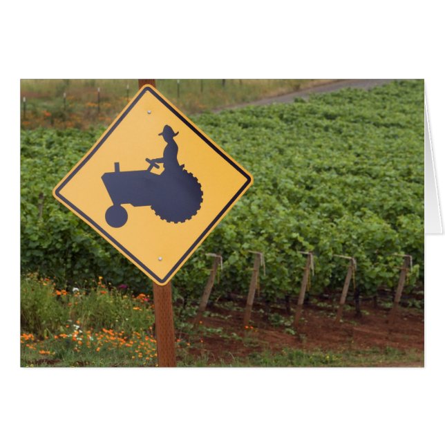 A yellow tractor crossing sign in the vineyard (Front Horizontal)