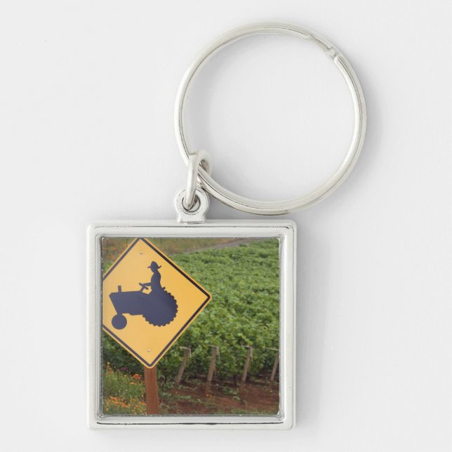 A yellow tractor crossing sign in the vineyard key ring (Front)
