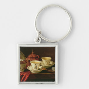 A Yixing Teapot and Chinese Porcelain Tete-a-Tete Key Ring