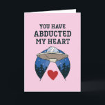 Abducted My Heart Alien Pun Funny Valentine's Day Holiday Card<br><div class="desc">Funny Valentine's Day card for your loved ones. Perfect for those who love humour, jokes and puns. A great Valentine's Day greeting card for husband, wife, boyfriend, girlfriend or best friend. Celebrate love with laughter and humour. Personalise the message to fit your occasion. You can also change the background colour...</div>
