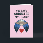 Abducted My Heart Alien Pun Funny Valentine's Day Holiday Card<br><div class="desc">Funny Valentine's Day card for your loved ones. Perfect for those who love humour, jokes and puns. A great Valentine's Day greeting card for husband, wife, boyfriend, girlfriend or best friend. Celebrate love with laughter and humour. Personalise the message to fit your occasion. You can also change the background colour...</div>
