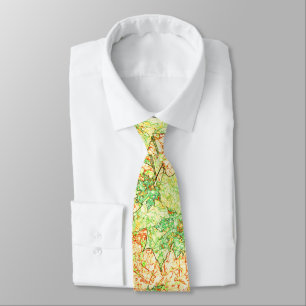 Abstract acer leaf on scratched ground, on beige tie
