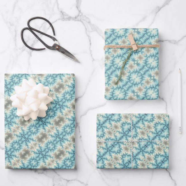 Abstract blue, grey snowflakes geometric pattern wrapping paper sheet (Front)