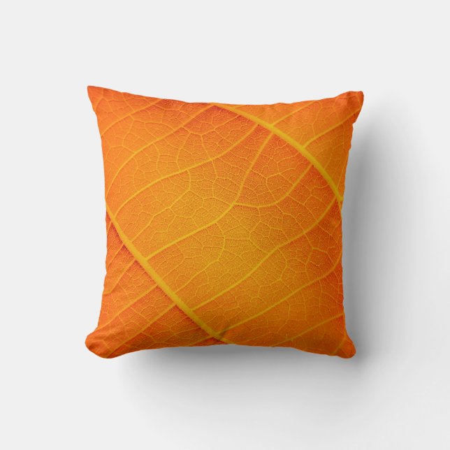 Abstract closeup of an orange and yellow leaf text cushion (Front)