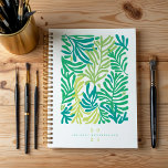 Abstract Colourful Tropical Leafs Personalised  Planner<br><div class="desc">Brighten your planning routine with our eye-catching abstract colourful botanical tropical leaves planner. Featuring bold, vibrant tropical leaves woven together in an artistic, abstract design, this planner is perfect for those who love a touch of fun and creativity in their everyday organisation. Customise it with your name and year to...</div>