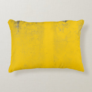 Abstract colourful yellow cement wall texture and decorative cushion