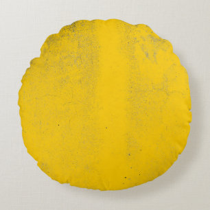 Abstract colourful yellow cement wall texture and round cushion