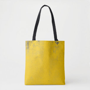 Abstract colourful yellow cement wall texture and  tote bag