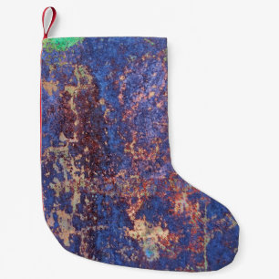 Abstract corroded colourful rusty metal background small christmas stocking