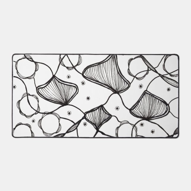 Abstract design of leaves in the wind desk mat (Front)