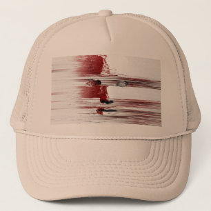 Abstract face in red trucker hat