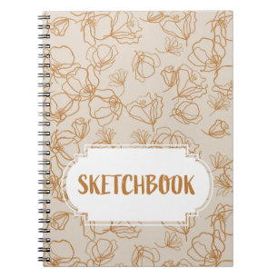 Abstract flowers over beige  notebook