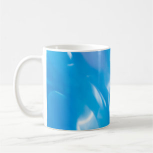 Abstract glitter lights on blue background. Round Coffee Mug