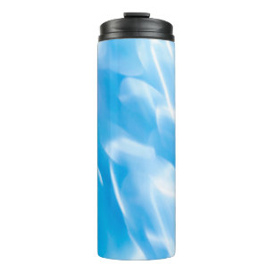 Abstract glitter lights on blue background. Round Thermal Tumbler