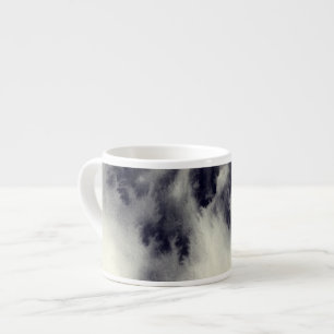 Abstract ink painting on grunge paper texture. espresso cup