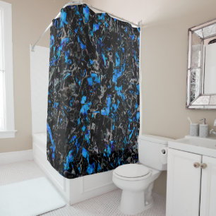 Abstract looking bat wings over stained turquoise shower curtain
