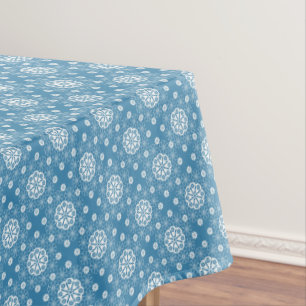 Abstract openwork floral pattern in light blue col tablecloth