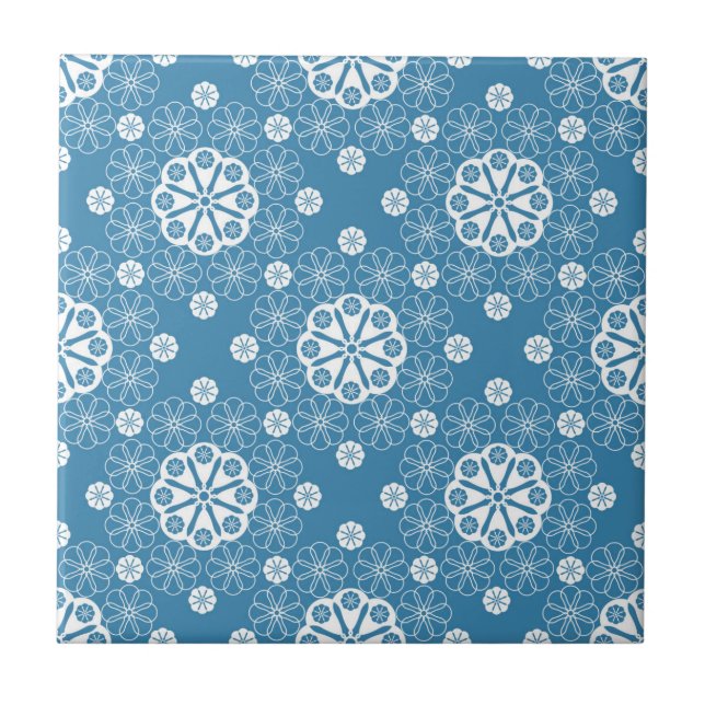 Abstract openwork floral pattern in light blue col tile (Front)