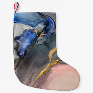 Abstract pink-blue background with beautiful smudg small christmas stocking