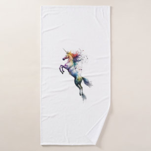 Abstract rainbow coloured watercolor of an unicorn bath towel