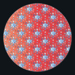 Abstract red and blue Christmas snowflakes Classic Round Sticker<br><div class="desc">Abstract blue and white Christmas snowflakes pattern on a red background. Need more? Check out other holiday designs at my store! Cheers! :)</div>