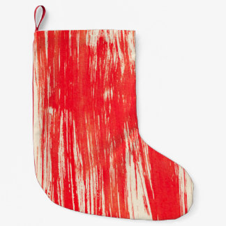 Abstract red background from watercolor small christmas stocking