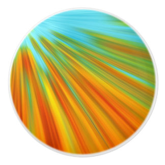 Abstract red yellow orange green stripes on blue ceramic knob