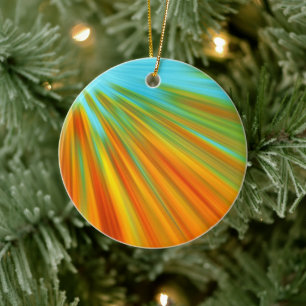 Abstract red yellow orange green stripes on blue ceramic tree decoration