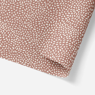 Abstract scattered rice snow dots in brown  tissue paper