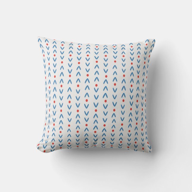 Abstract seamless pattern in blue and red on cream cushion (Front)