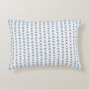 Abstract seamless pattern in blue and red on cream decorative cushion