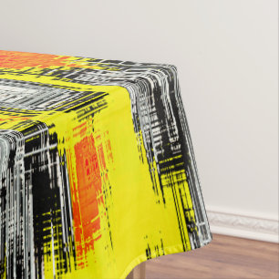 Abstract squares formed from scratches over yellow tablecloth