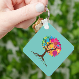 Abstract tree with roots and colourful leaves. key ring