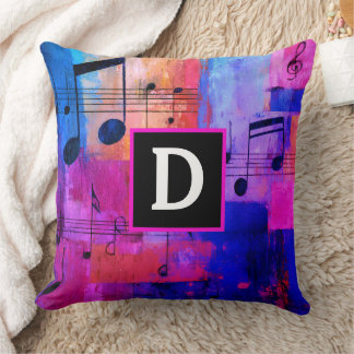 Abstract yellow red blue musical notes monogrammed cushion