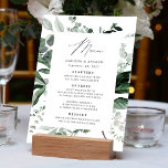 Abundant Greenery Dinner Wedding Menu<br><div class="desc">Elegant wedding menu featuring "Menu" displayed in a modern calligraphy script and menu details framed by eucalyptus, fern, and other rich greenery on a white background. Personalise the botanical wedding menu with your names, wedding date, and dinner menu. The simple wedding menu reverses to a solid dark green background with...</div>