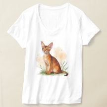 Abyssinian cat surrounded by soft colours and gree