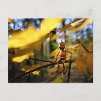Acorn elf on a maple tree autumn postcard