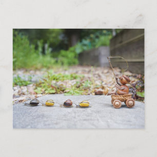Acorn elf rides in a cart pulled by snails postcard